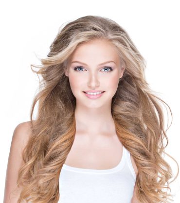 beautiful-happy-woman-with-long-curly-hair-PKY4FFN.jpg
