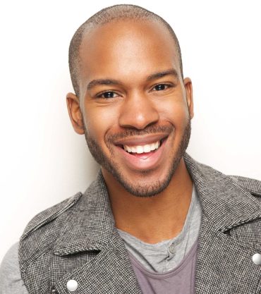 portrait-of-a-happy-young-man-smiling-PEAUPXQ-scaled.jpg